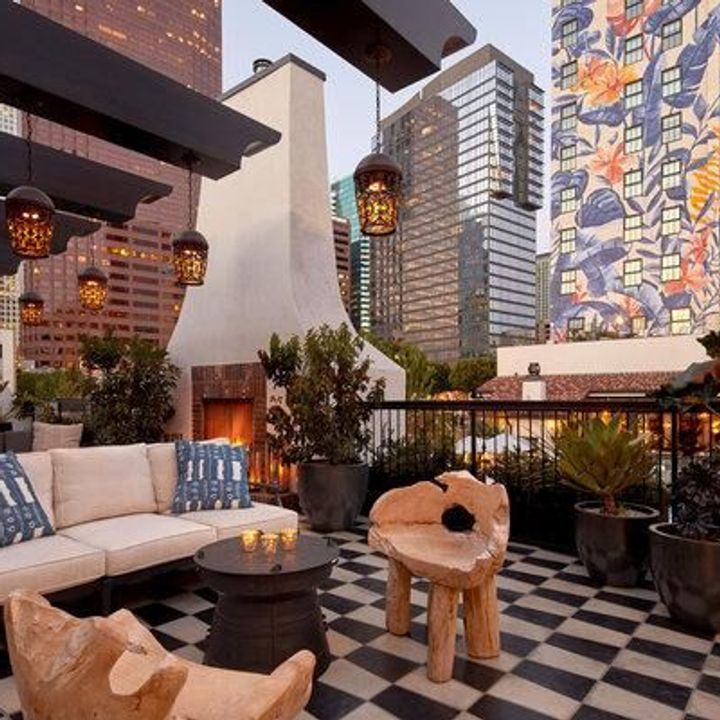 A terrace surrounded by skyscrapers at Hotel Figueroa in LA.