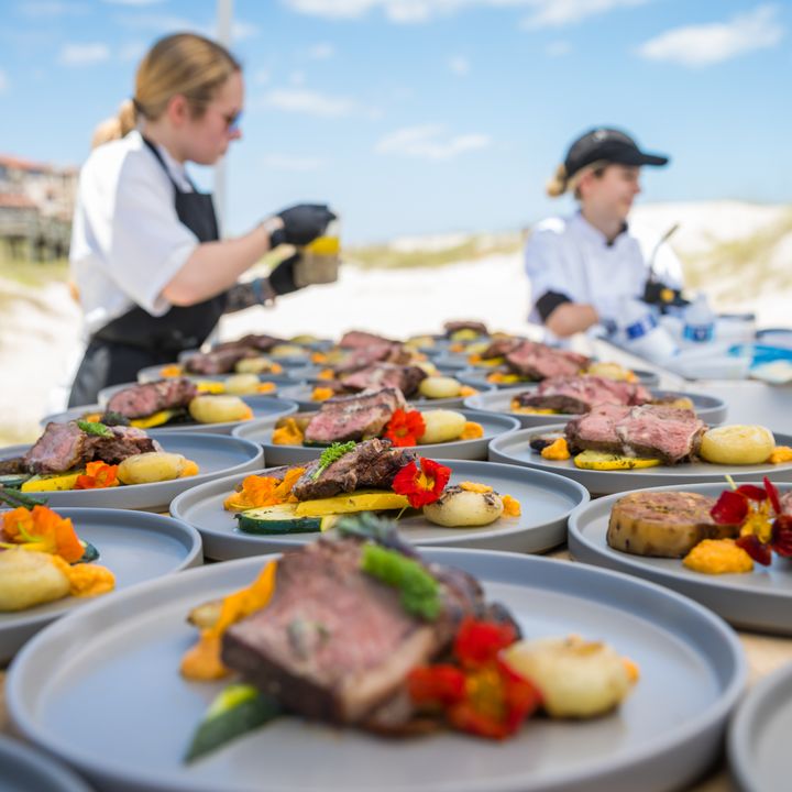 Chefs preparing food at Fish to Fork festival