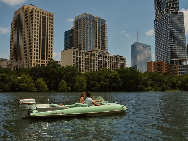 A boat on the water of Lady Bird Lake in Austin.