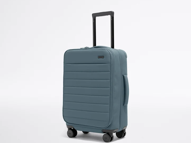 A bluish-gray soft-sided wheeled carry-on suitcase against a white background.