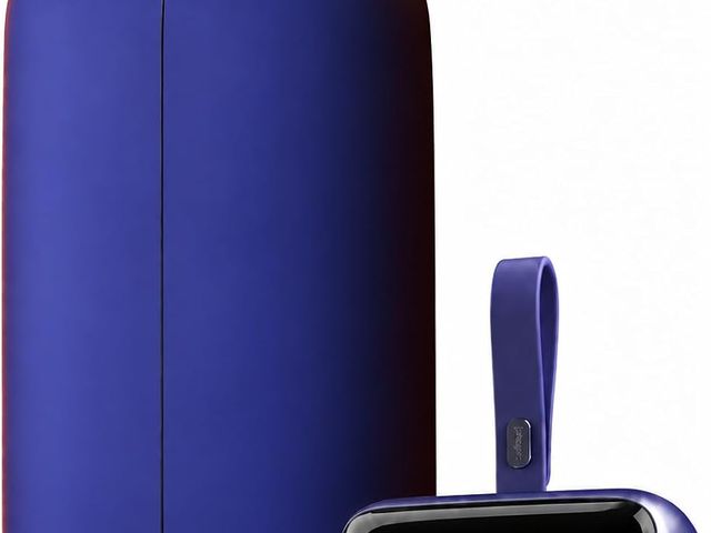 A bright blue portable clothes dryer against a white background.