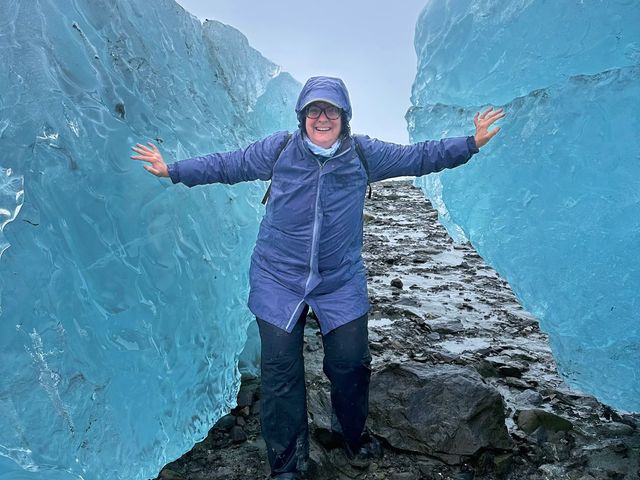 Writer Kate Loweth is seen between two glaciers in Glacier Bay.