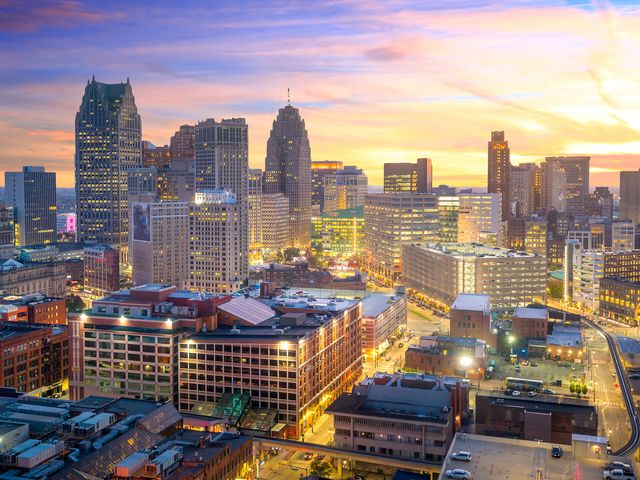 An aerial view over the Detroit skyline at night.