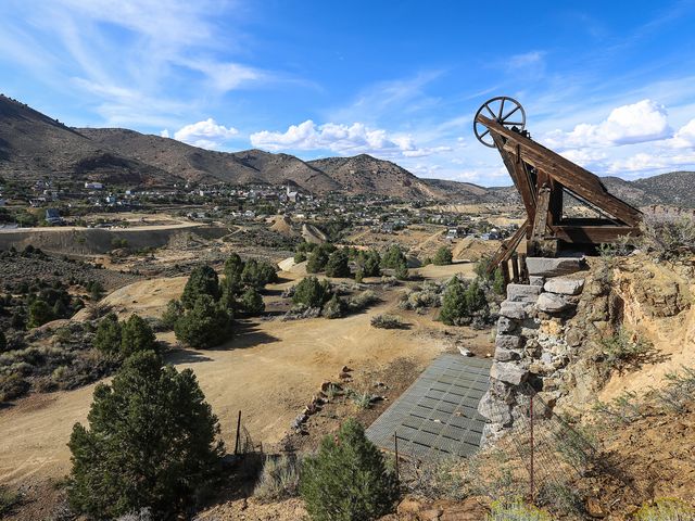 A mine frame is visible on a hill overlooking Virginia City in Nevada.