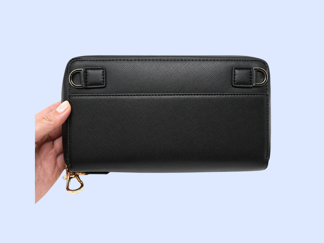 A compact wallet-style black rectangular shaped purse against a white background.