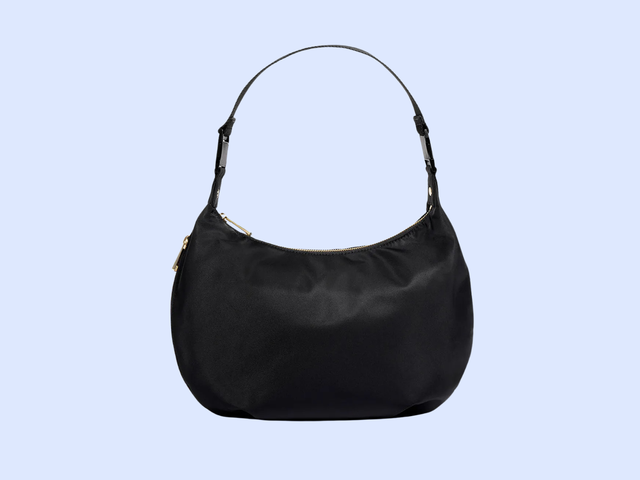 A black nylon bag against a white background.