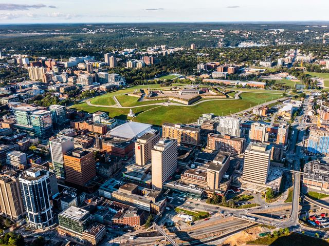 An aerial view over the Halifaxskyline with a park in the middle.