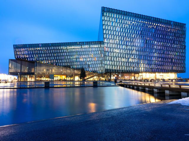 The exterior of the Harpa concert hall with its futuristic glass building in Reykjavik Iceland.