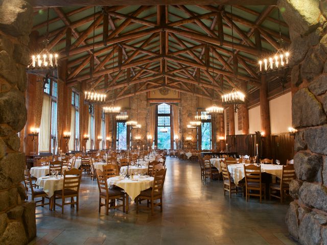 An empty dining room with rustic decor.