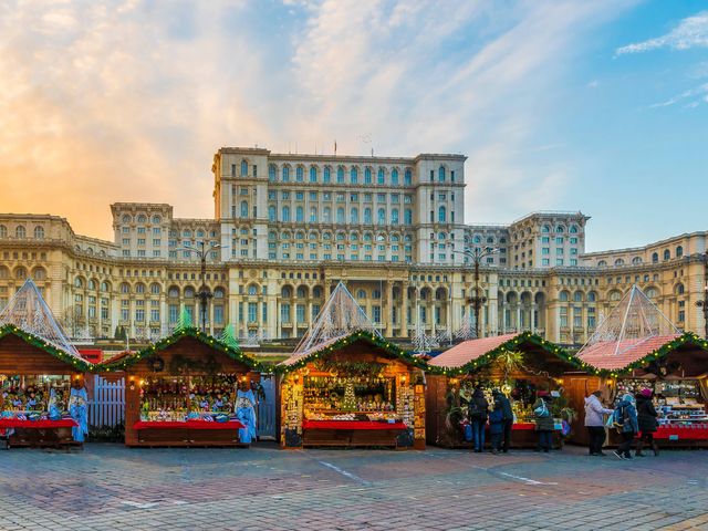 A view of the Christmas Market in Bucharest, set up in front of the Parliament building.