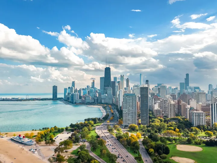 Chicago skyline aerial drone view from above, lake Michigan and city of Chicago downtown skyscrapers.