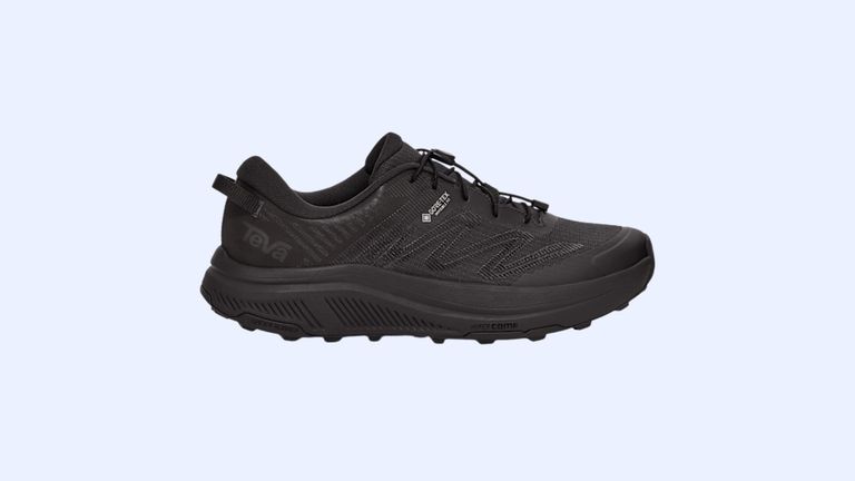 A black Teva sneaker against a blue background.